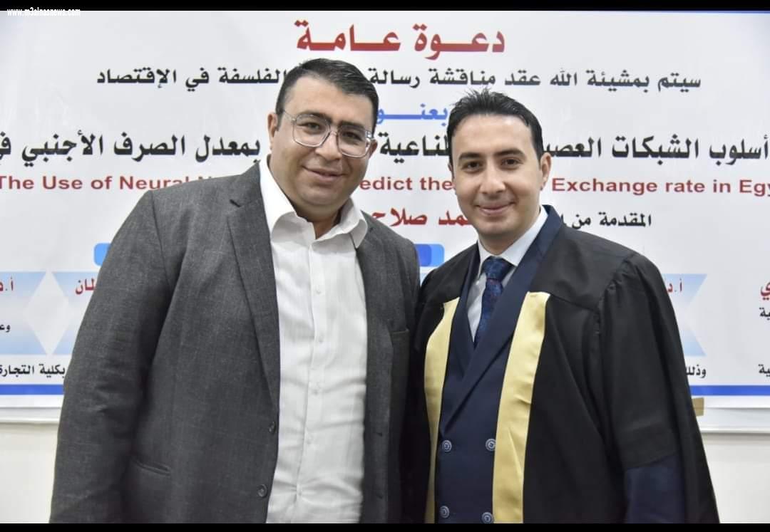 الزميل محمد عطية يهنىء الدكتور احمد صلاح الشافعى لحصولة على الدكتوراة