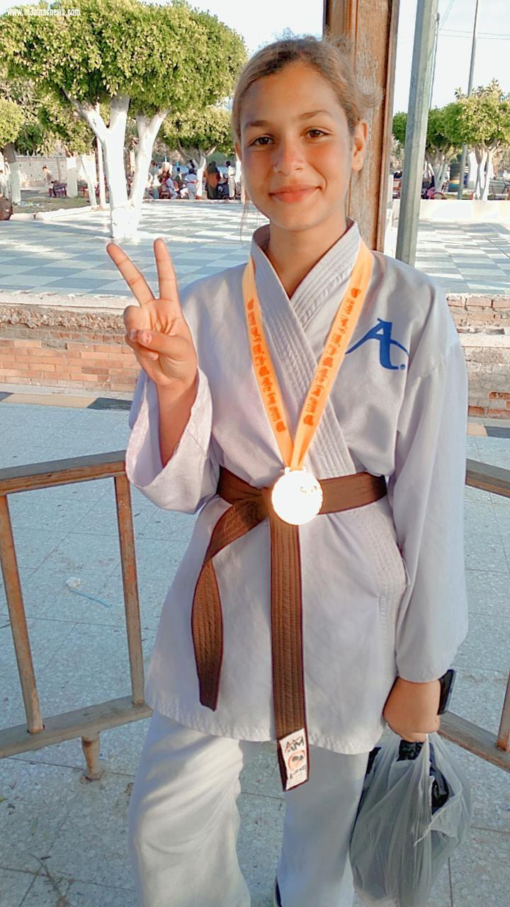 حنين.. ابنة الحامول تحصل على الميدالية الذهبية فى بطولة وسط الدلتا للكاراتيه